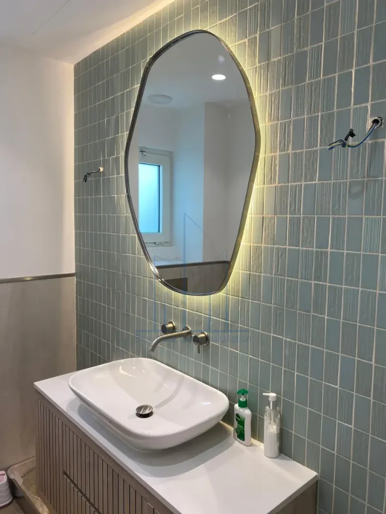 Custom shaped wall mirror