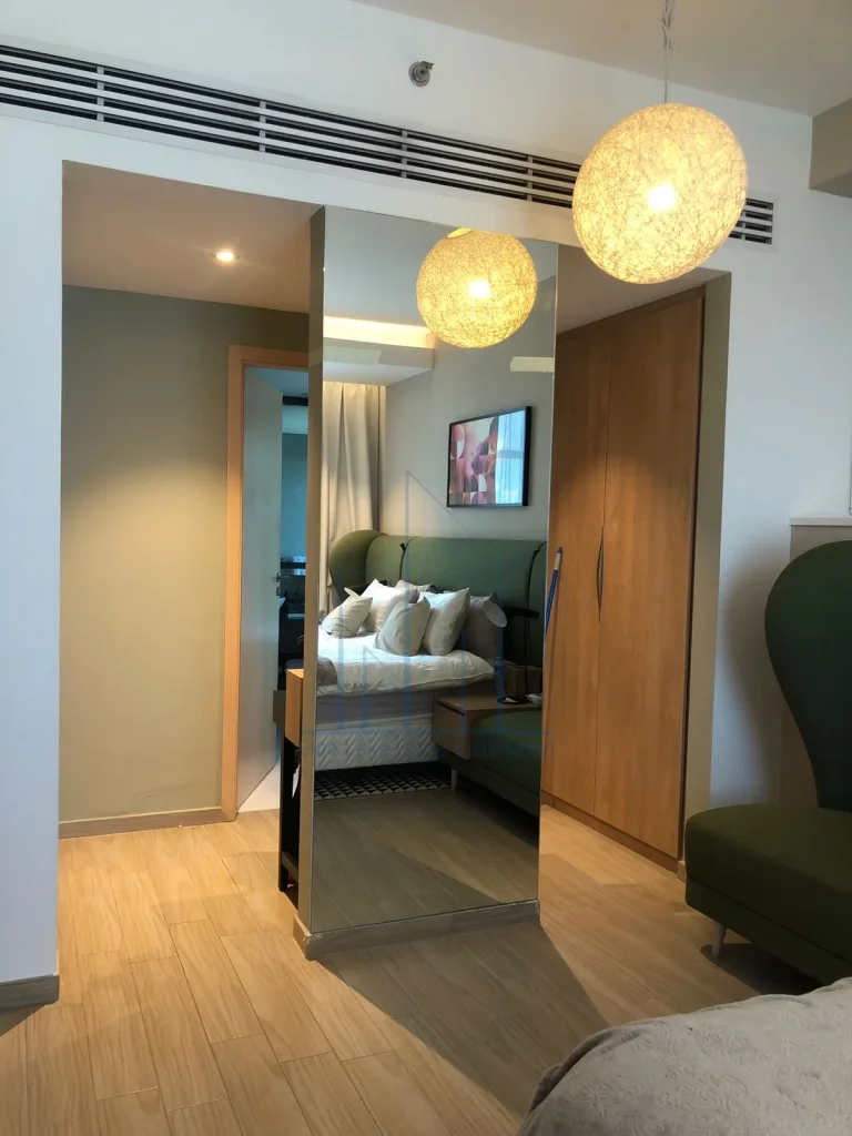 Large made-to-measure wall mirror installation