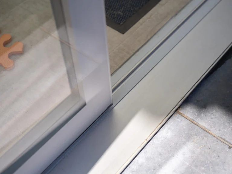 Sliding glass door for an interior opening