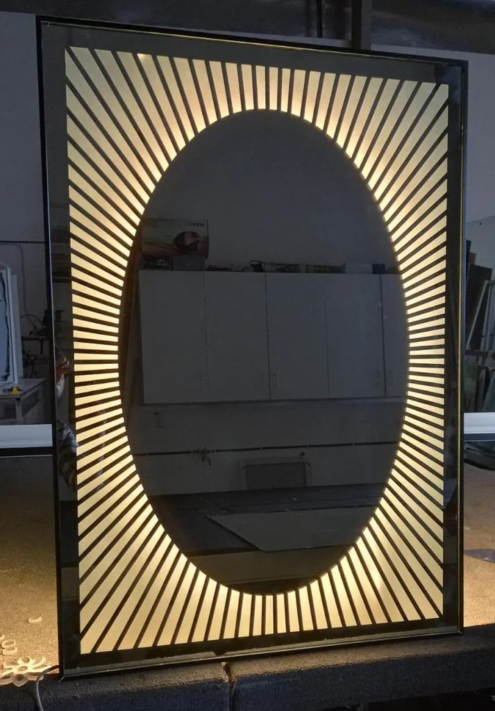 Designer LED mirror with a decorative frame
