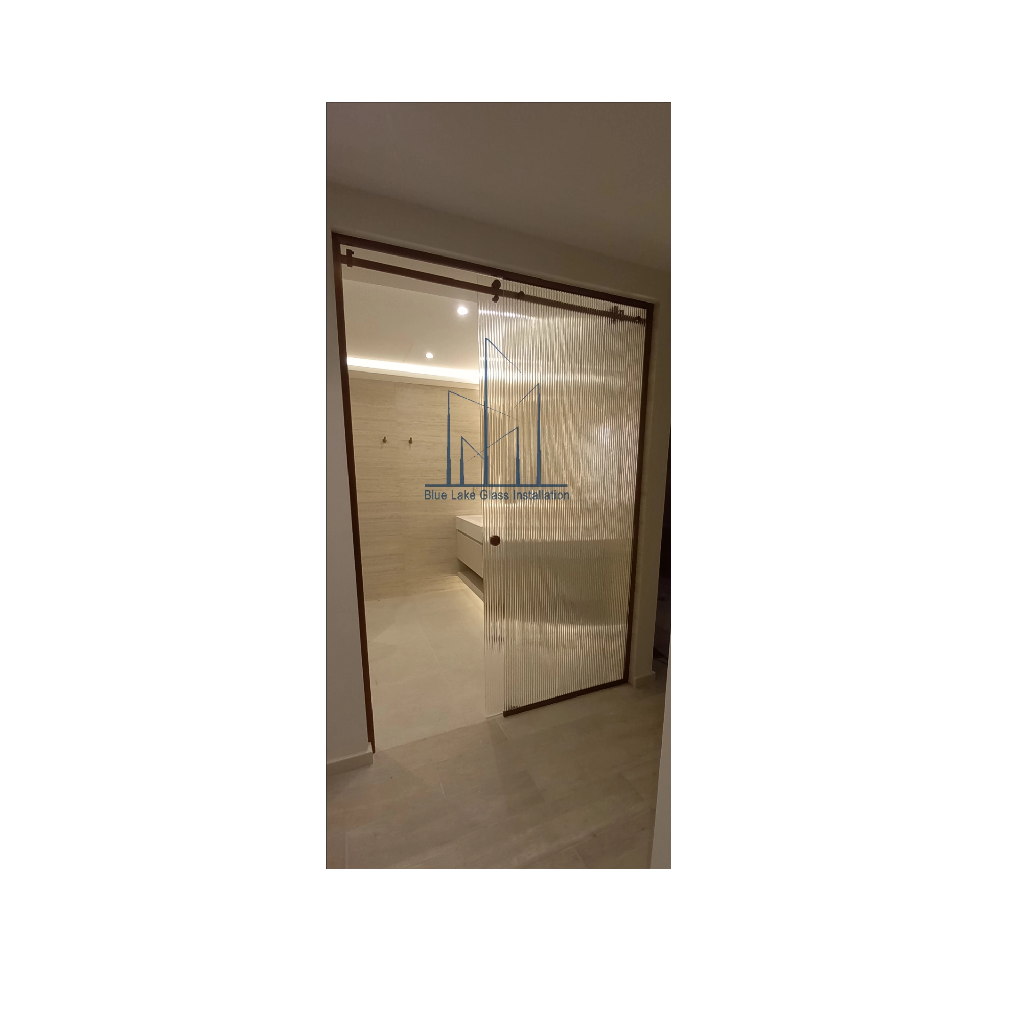 Fluted glass sliding shower door