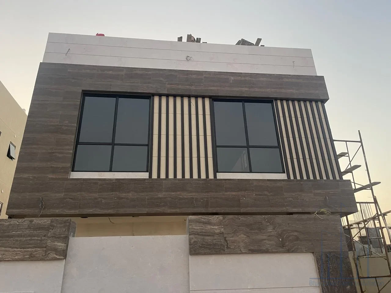 Custom aluminum window installation with glazed opening