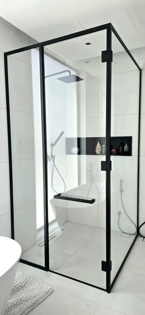 Framed shower glass enclosure with prepared hardware and glass panels